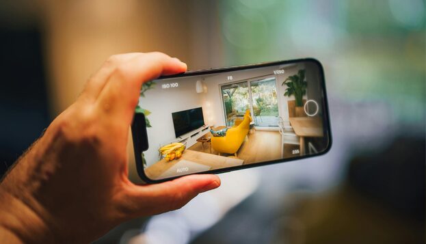 A property video tour playback on a mobile phone.